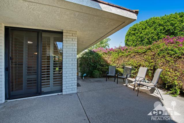 6 Exeter Court Rancho Mirage, CA 92270 - Photo 19 of 20 a view of backyard with outdoor seating and plants