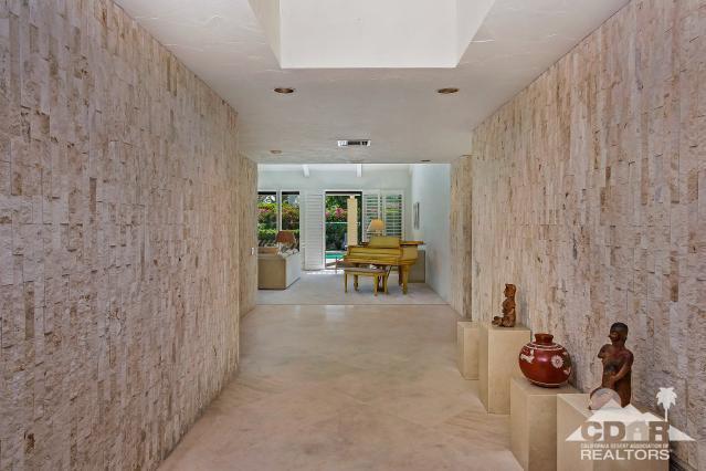 6 Exeter Court Rancho Mirage, CA 92270 - Photo 3 of 20 a view of a entryway with furniture and floor to ceiling window