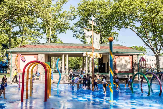 a front view of a house with garden and outdoor seating