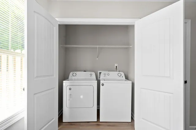 a utility room with dryer and washer