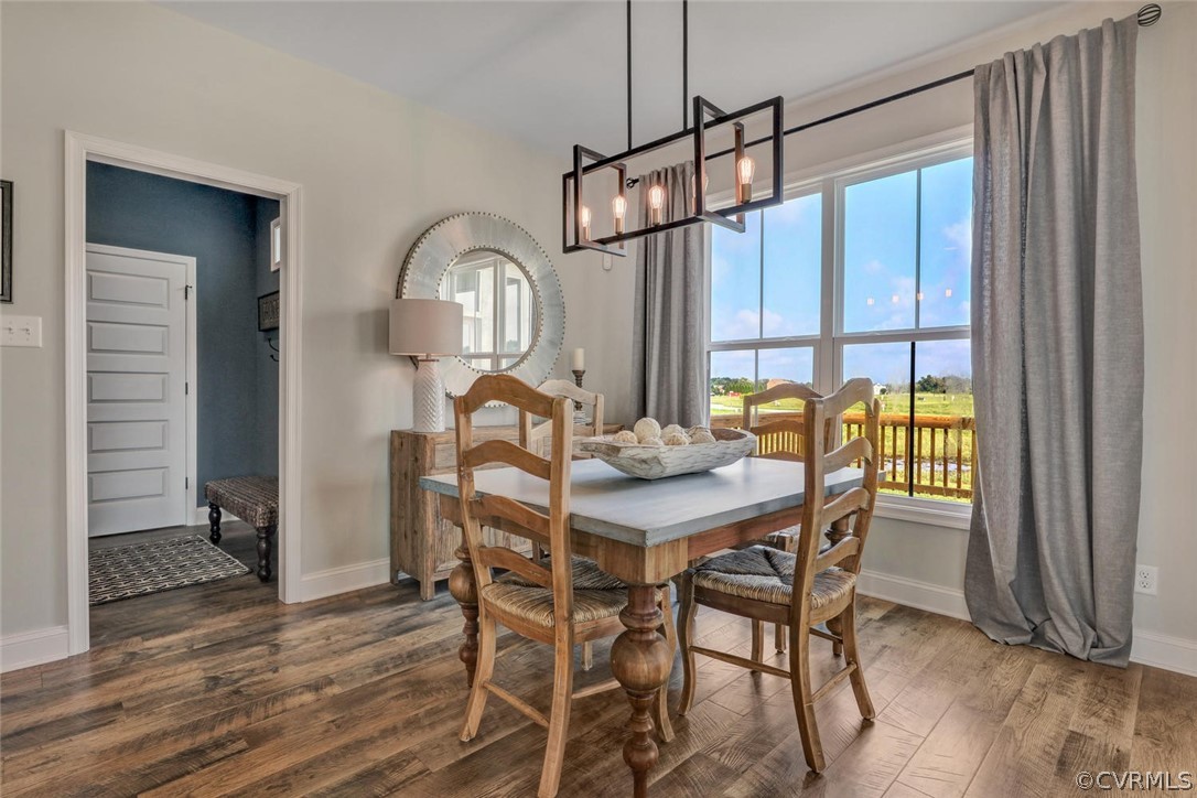 11831 Winterpock Road Chesterfield, VA 23838 - Photo 17 of 34 a view of a dining room with furniture window and wooden floor