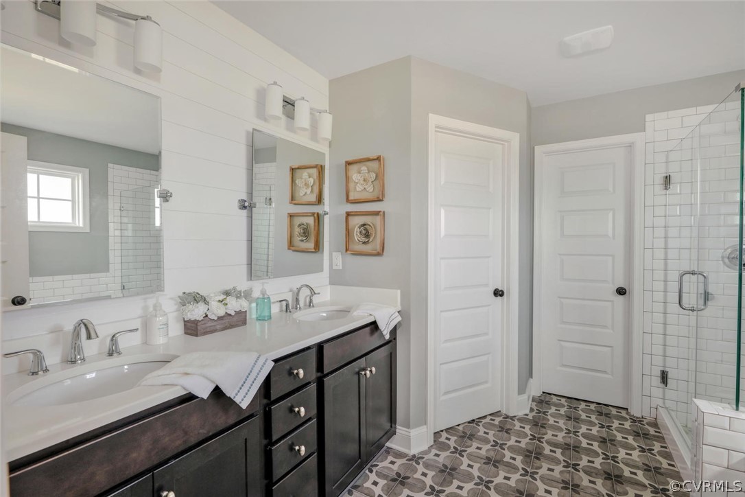 11831 Winterpock Road Chesterfield, VA 23838 - Photo 23 of 34 a spacious bathroom with a sink and a mirror