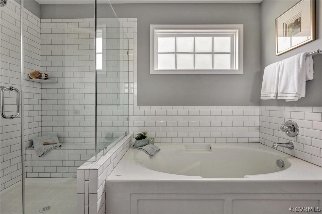 11831 Winterpock Road Chesterfield, VA 23838 - Photo 25 of 34 a bathroom with a bathtub and shower