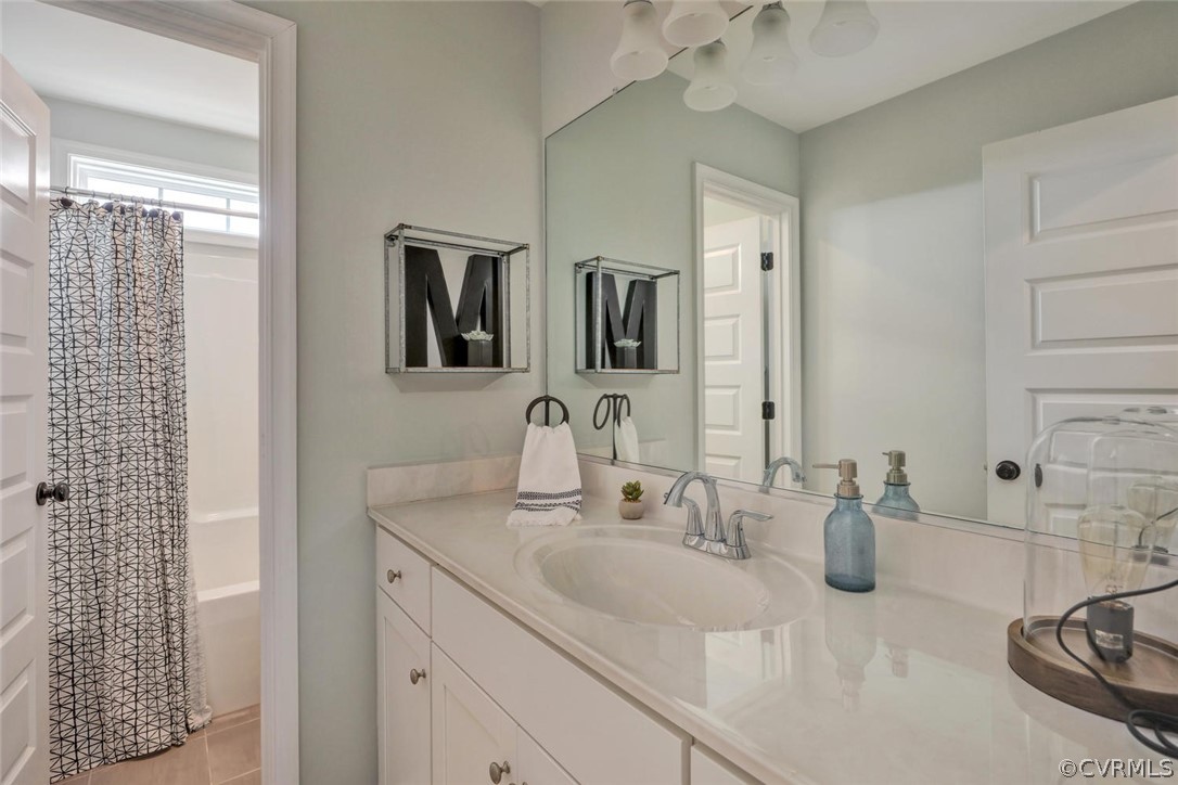 11831 Winterpock Road Chesterfield, VA 23838 - Photo 28 of 34 a bathroom with a sink and a mirror