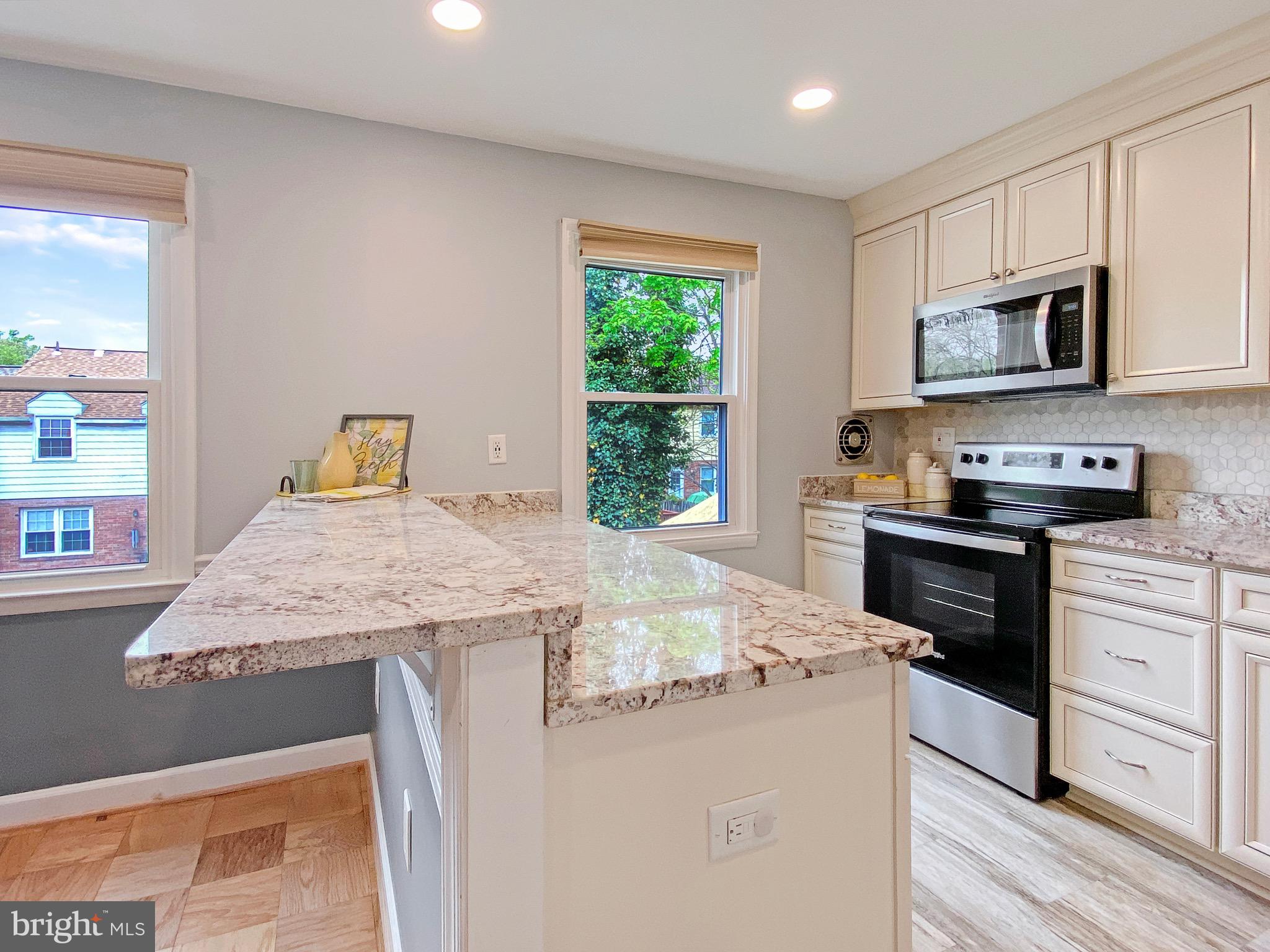 8352 Imperial Drive, Unit 1G Laurel, MD 20708 - Photo 13 of 35 Large Breakfast Bar Island