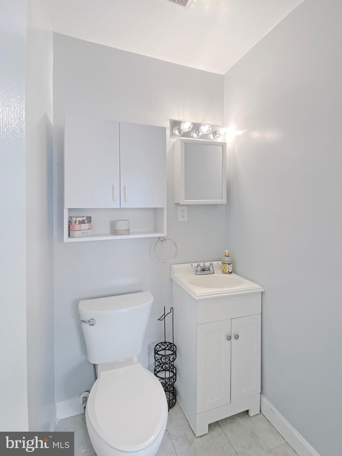 8352 Imperial Drive, Unit 1G Laurel, MD 20708 - Photo 18 of 35 En-suite half bath to primary bedroom