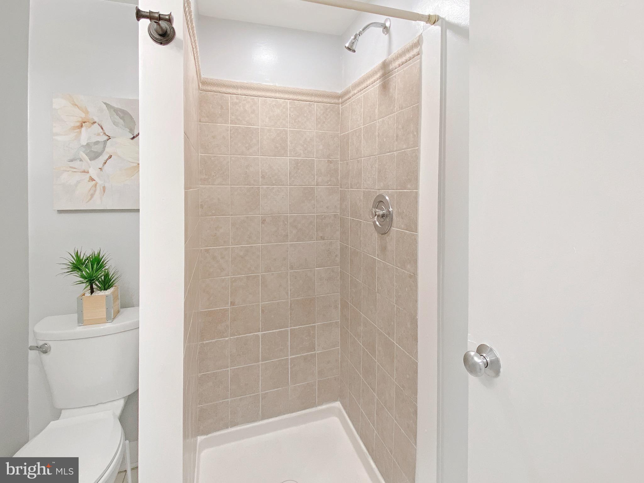 8352 Imperial Drive, Unit 1G Laurel, MD 20708 - Photo 30 of 35 Basement full bathroom