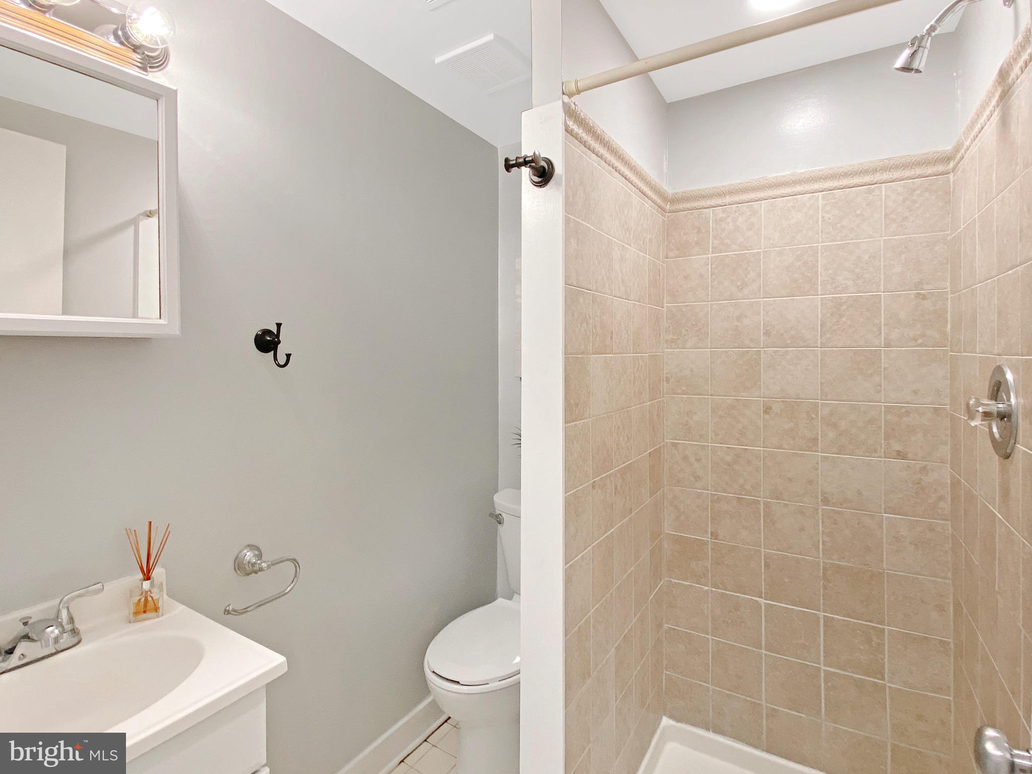 8352 Imperial Drive, Unit 1G Laurel, MD 20708 - Photo 31 of 35 Basement full bathroom