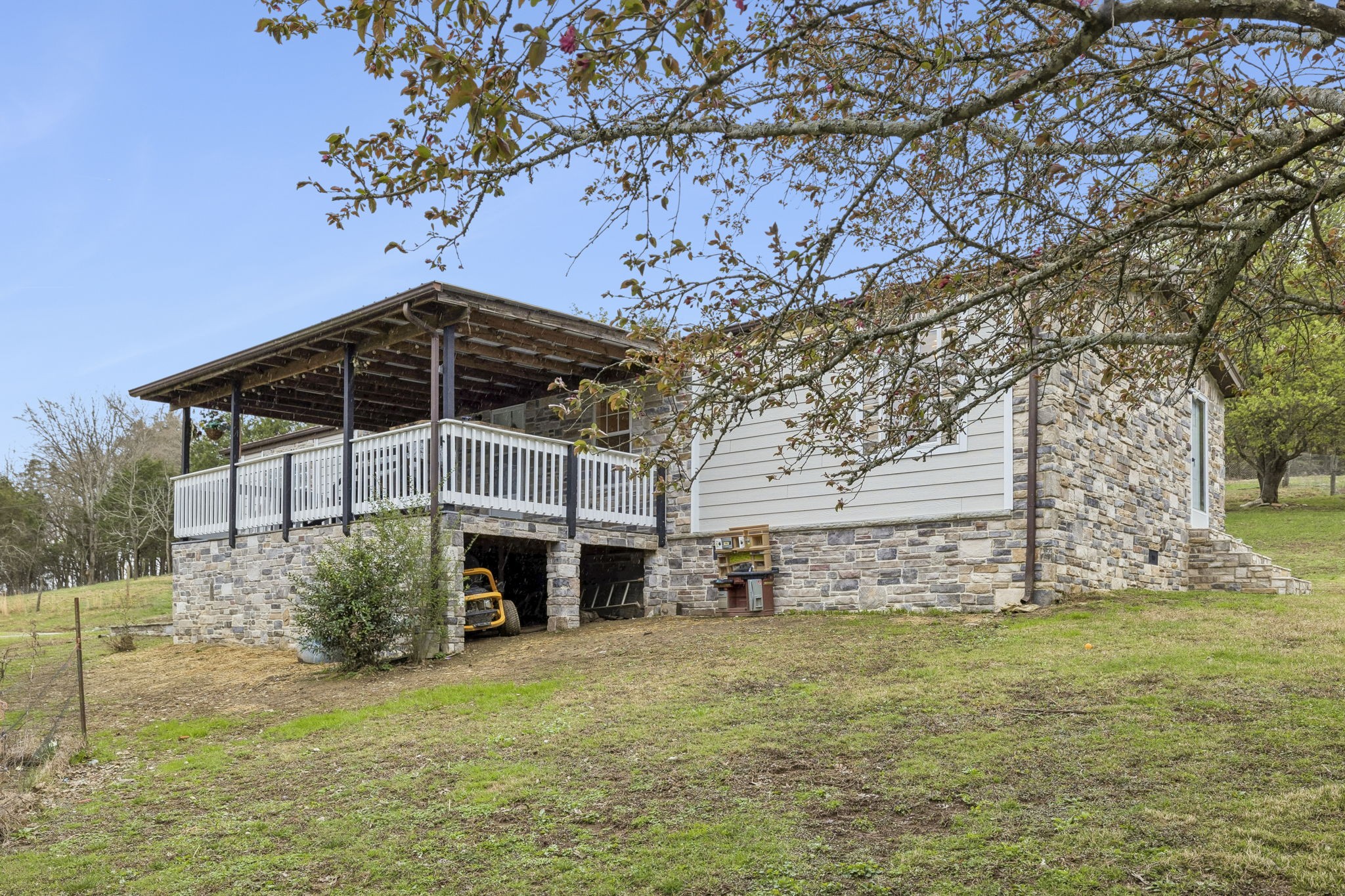 47 Riddleton Circle Riddleton, TN 37151 - Photo 32 of 46 a front view of a house with garden