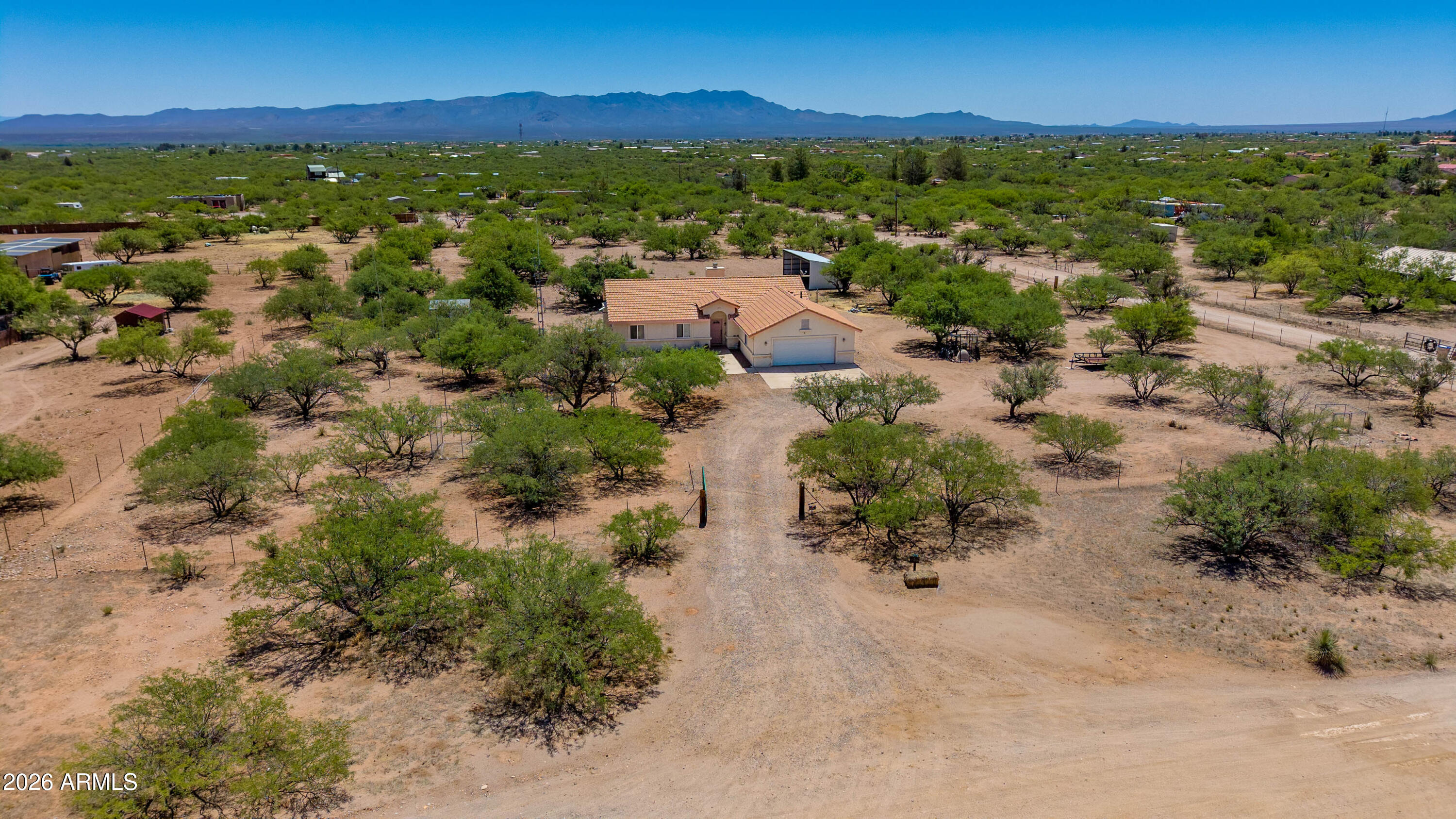 4575 South Kino Road Sierra Vista, AZ 85650 - Photo 4 of 25 a view of a lake with mountains in the background