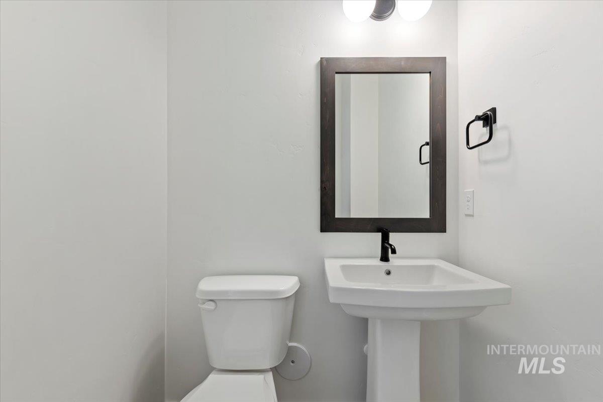 2391 East Snocreek Drive Eagle, ID 83616 - Photo 21 of 29 Half bathroom featuring toilet