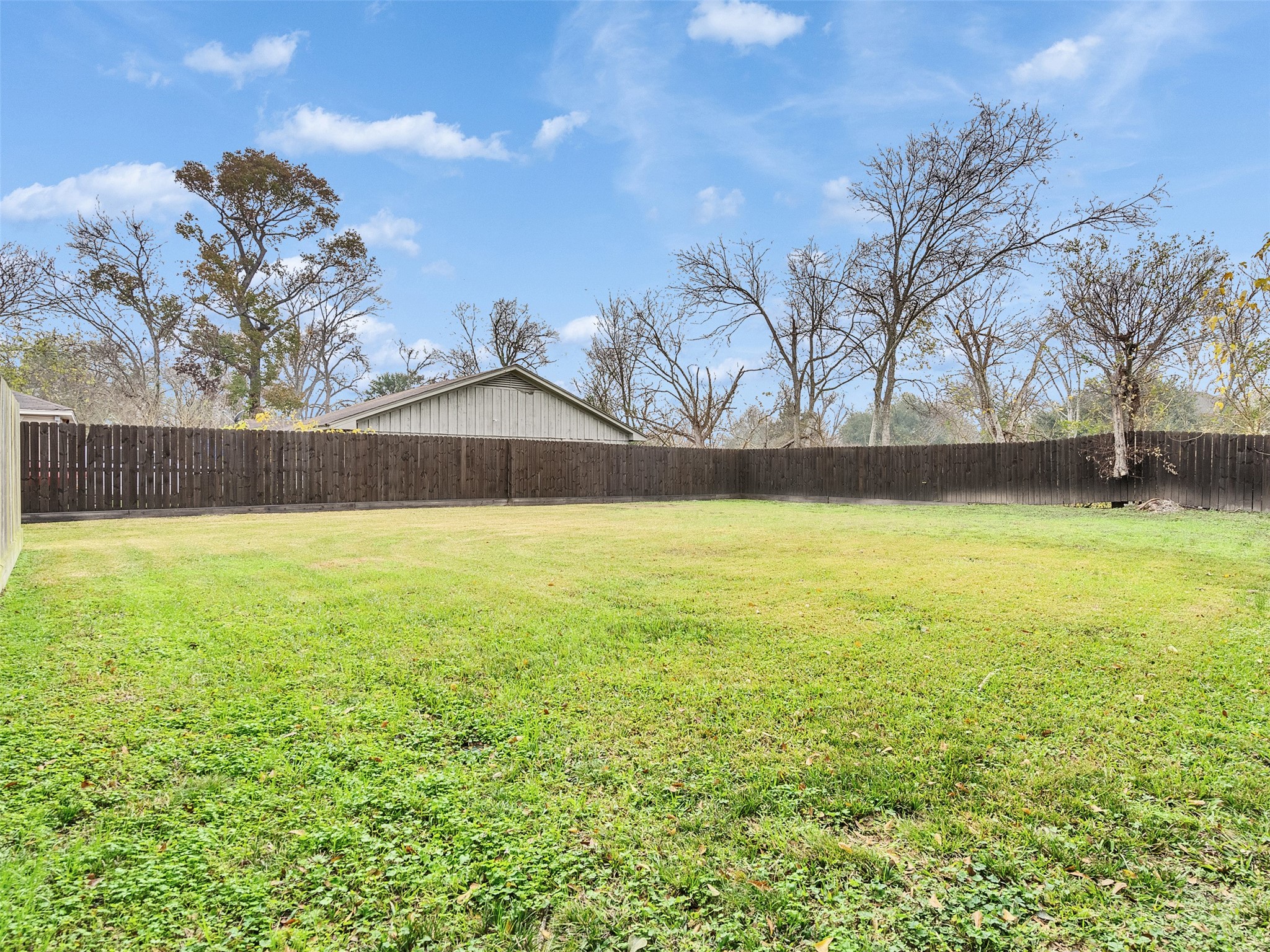 2411 Charles Road, Unit A Houston, TX 77093 - Photo 29 of 33 a view of a swimming pool with an outdoor space and seating area