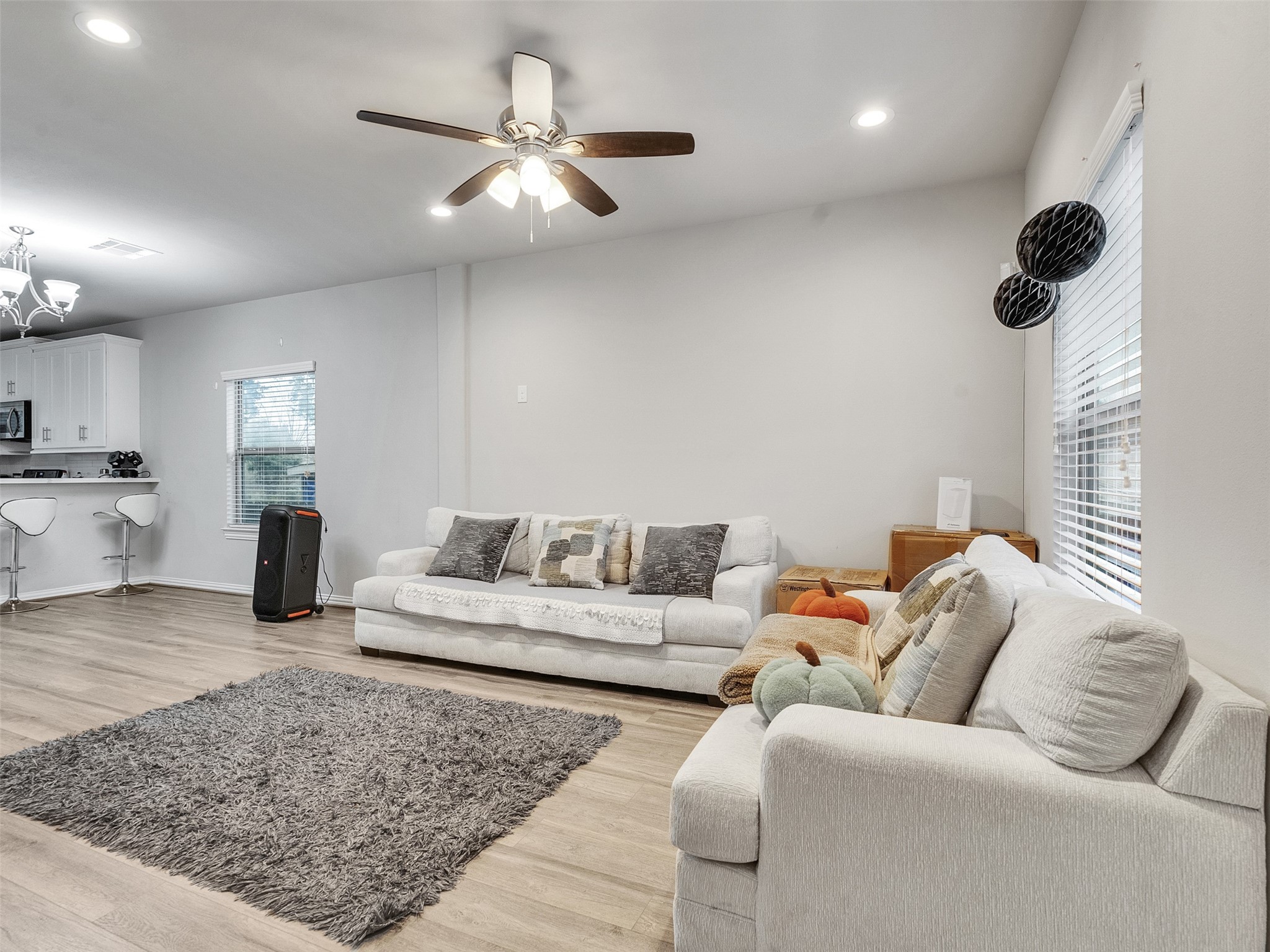 2411 Charles Road, Unit A Houston, TX 77093 - Photo 7 of 33 a living room with furniture and a view of kitchen