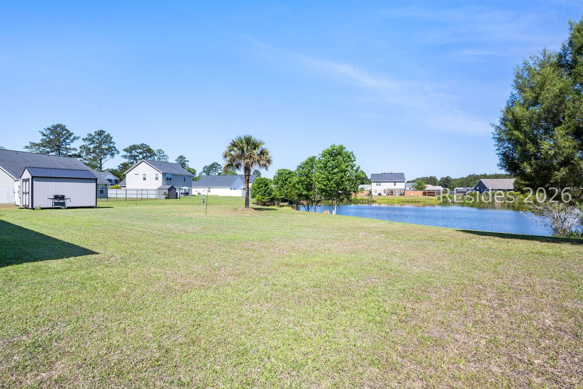 664 Ridgeland Lakes Drive Ridgeland, SC 29936 - Photo 33 of 39 Spacious Backyard with Lagoon View