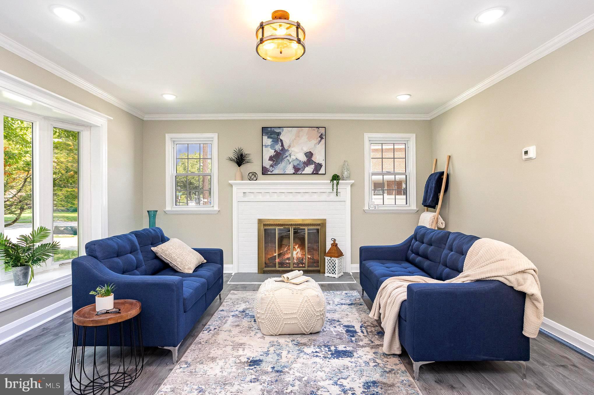 3001 Dunran Road Dundalk, MD 21222 - Photo 3 of 30 Warm and inviting living room w/ woodburning FP