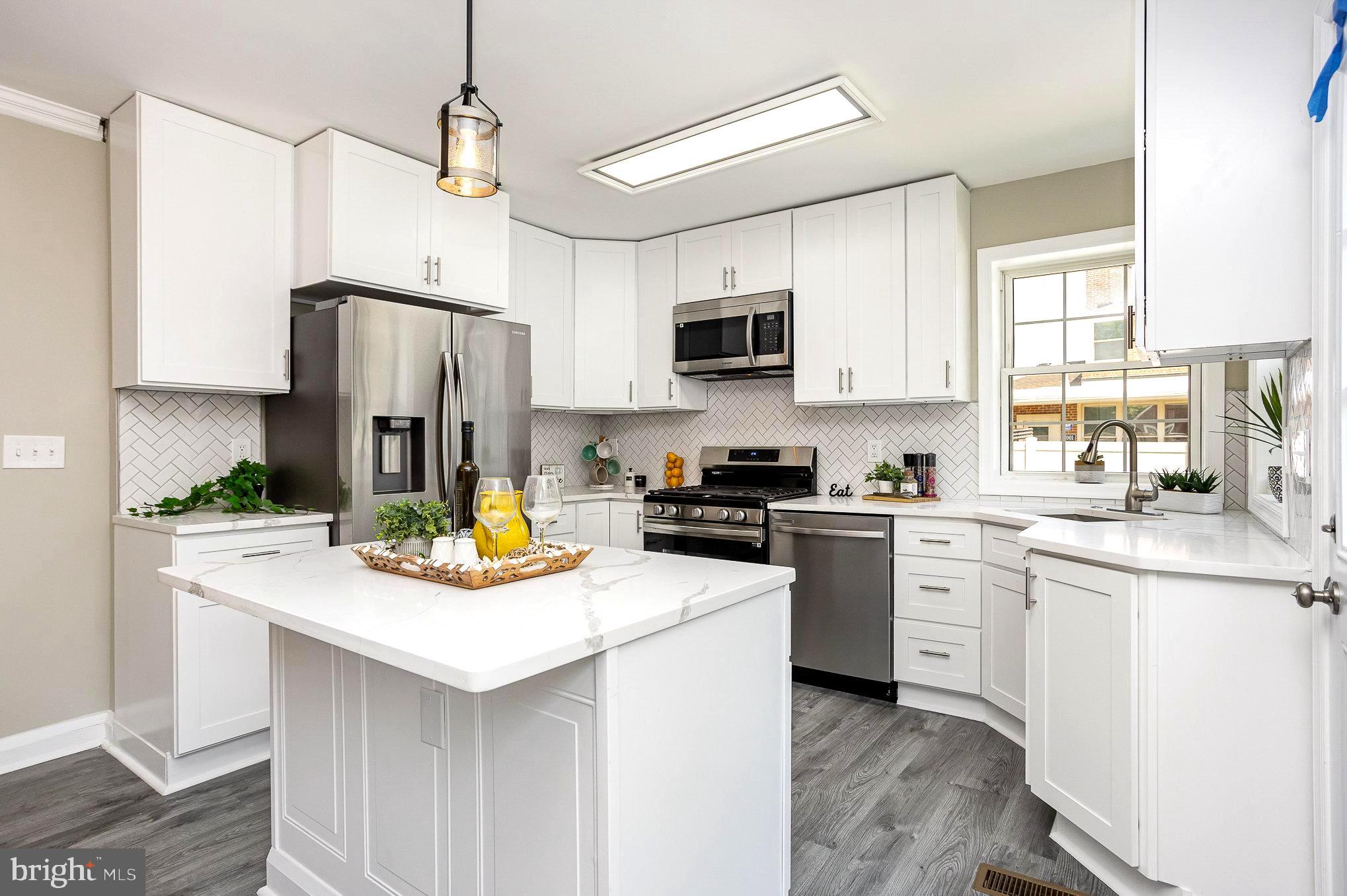 3001 Dunran Road Dundalk, MD 21222 - Photo 7 of 30 Island offers function, storage & seating