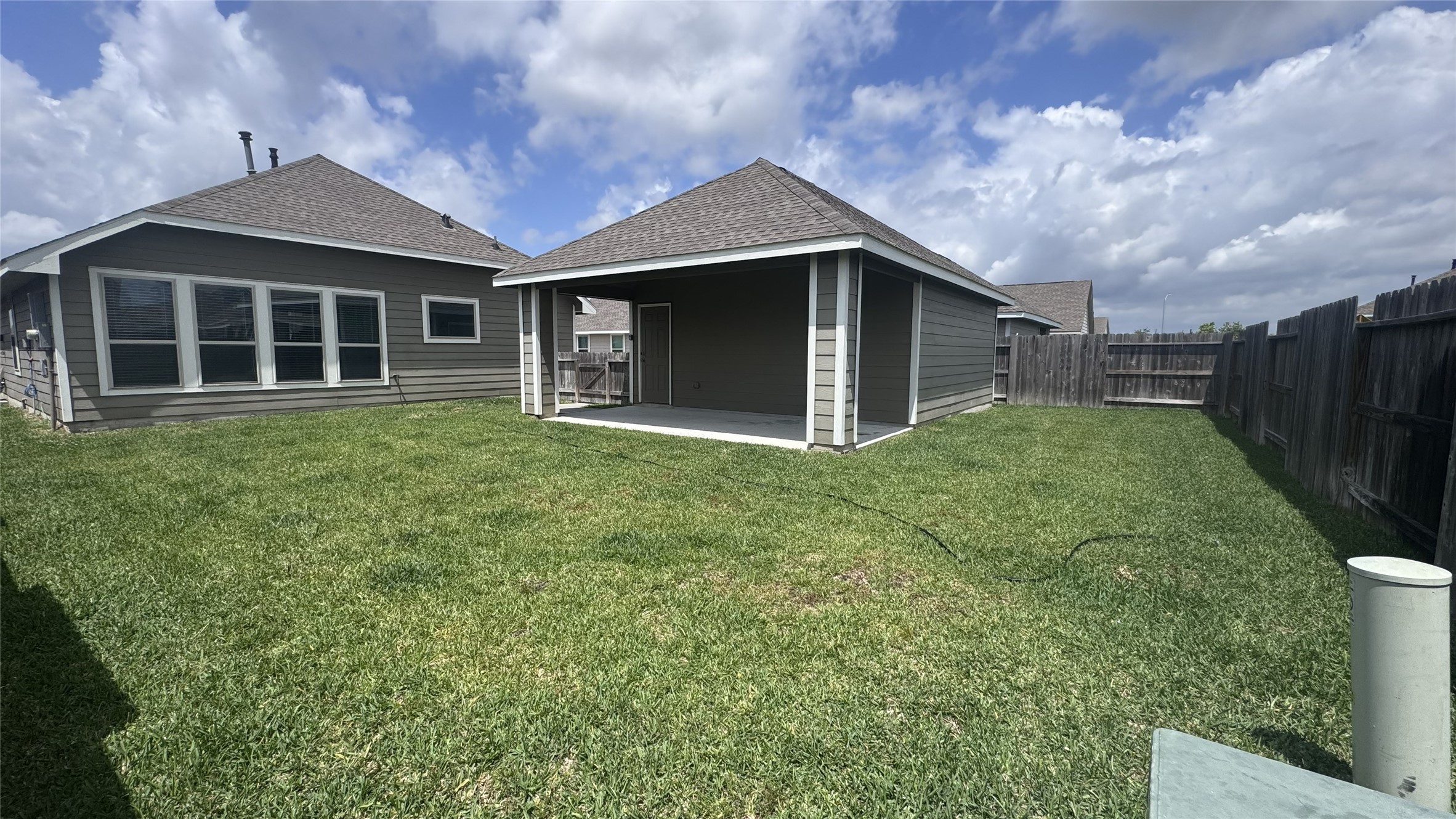 15746 Harding Bend Drive Humble, TX 77346 - Photo 12 of 18 a front view of a house with garden