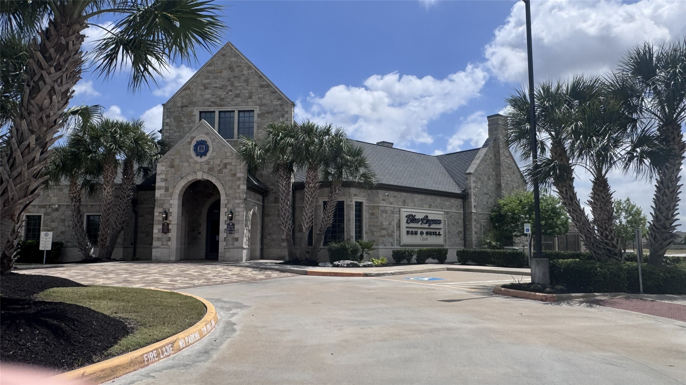 15746 Harding Bend Drive Humble, TX 77346 - Photo 13 of 18 a view of a house with palm trees