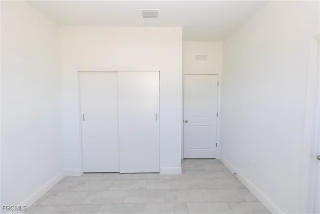 a bathroom with a sink and vanity