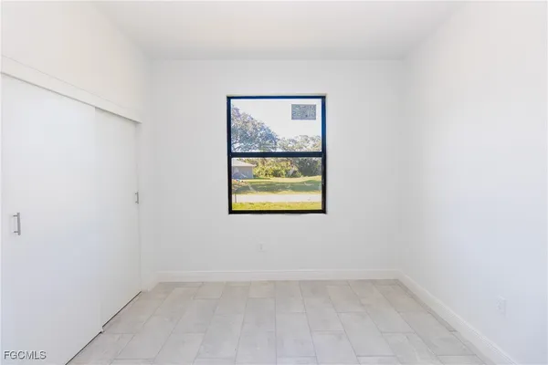 an empty room with a window
