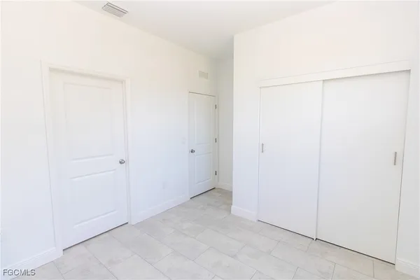 an empty room with closet