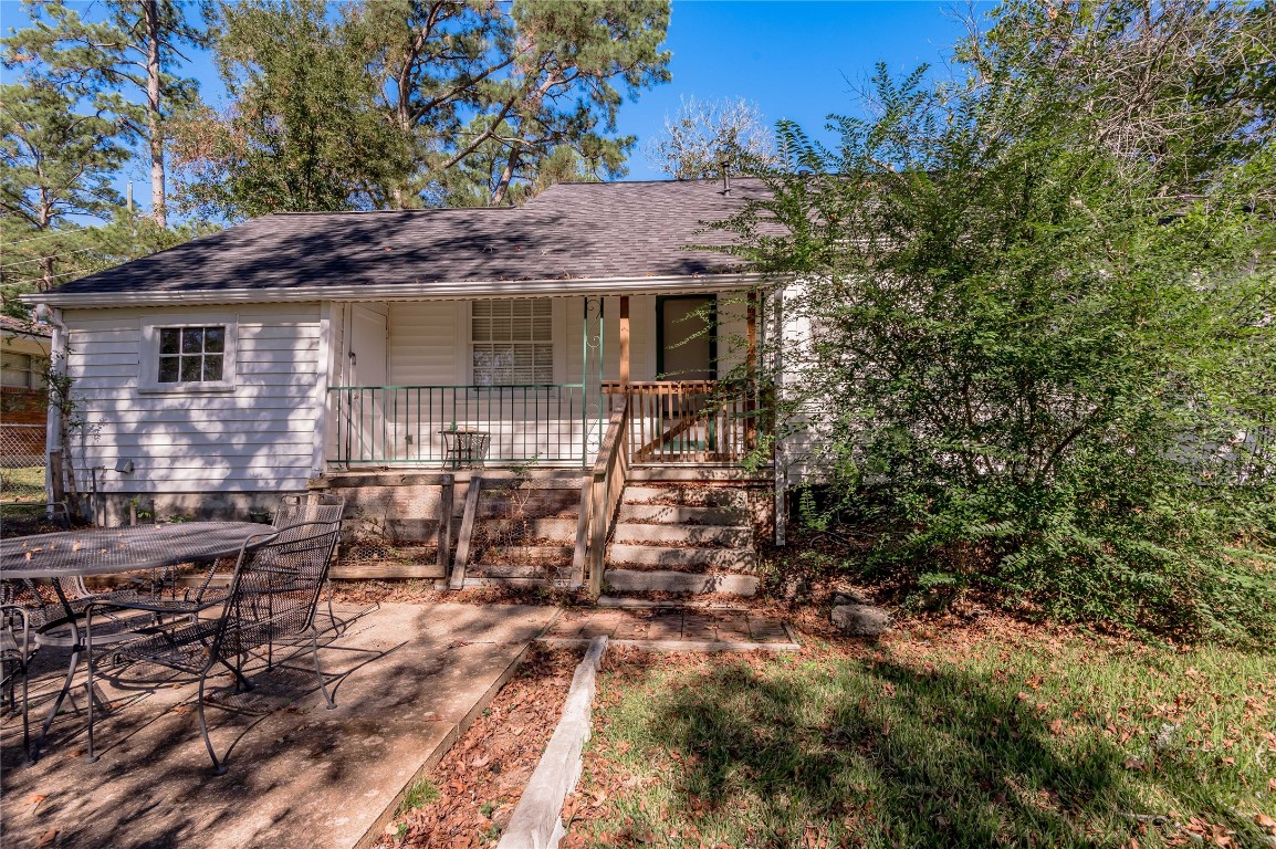 1415 22nd Street Huntsville, TX 77340 - Photo 23 of 30 a view of a chairs and table on the wooden floor