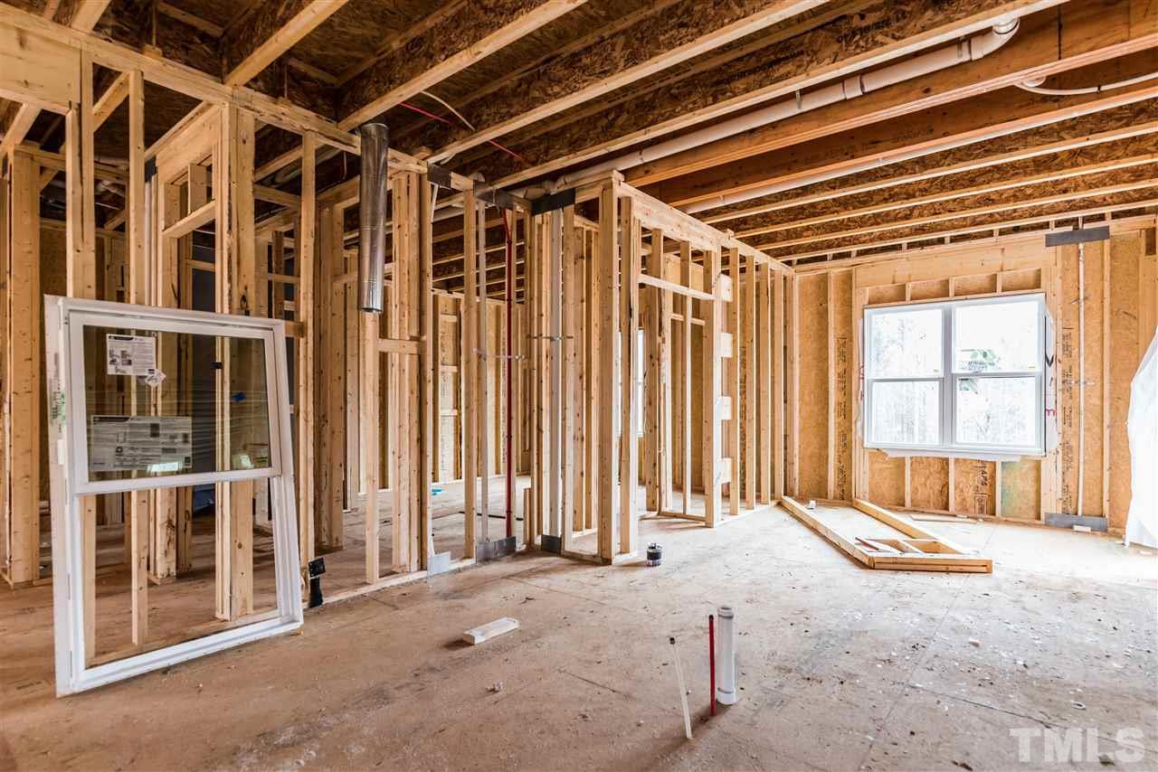 1117 Harrison Ridge Road Wake Forest, NC 27587 - Photo 5 of 6 a view of an empty room with a window