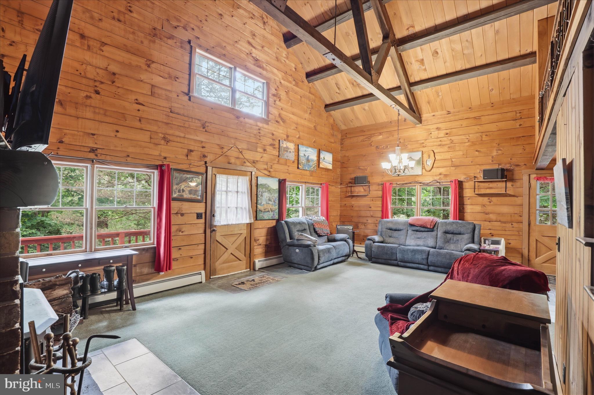 20 Star Lite Drive Lititz, PA 17543 - Photo 11 of 59 a living room with furniture and a floor to ceiling window