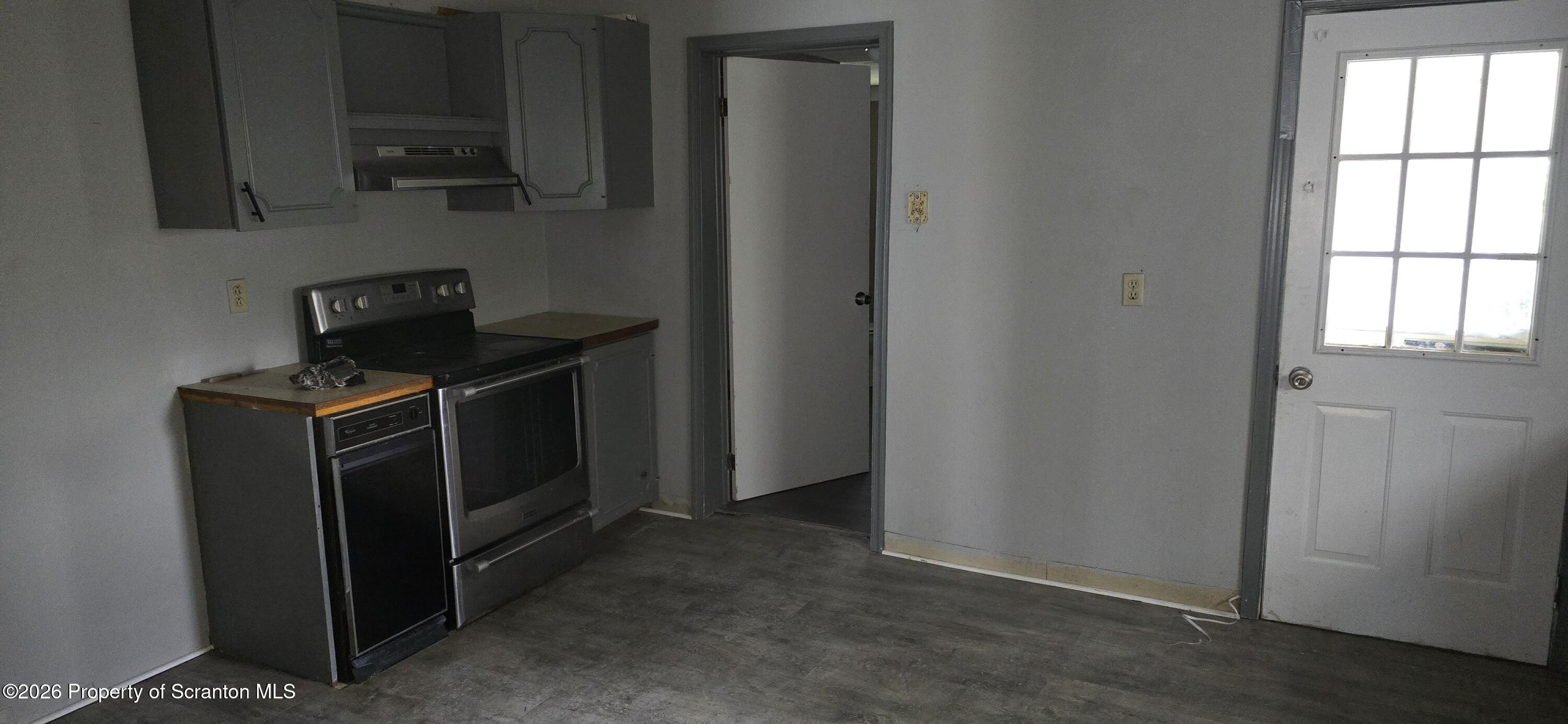 1140-1142 Academy Street Scranton, PA 18504 - Photo 12 of 49 a view of a kitchen with electric appliances