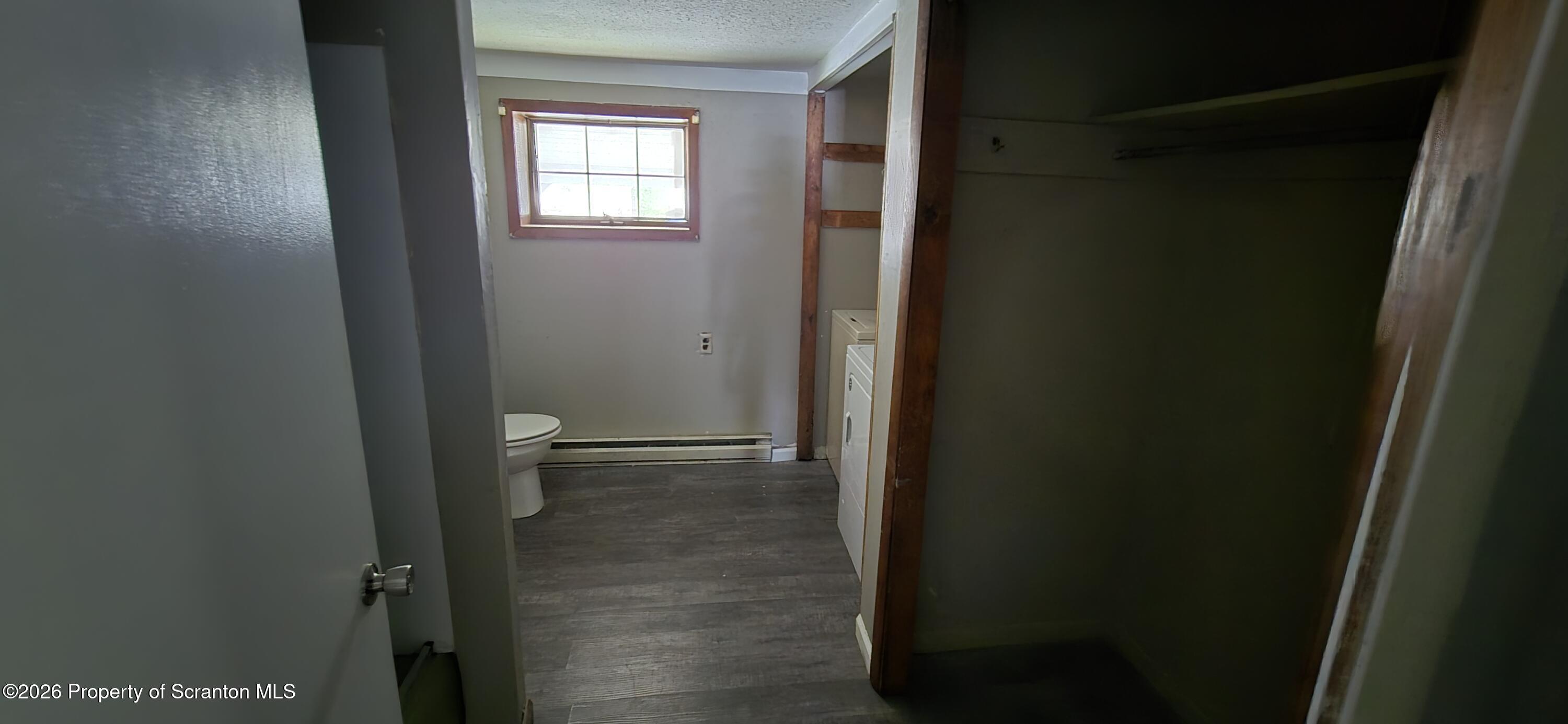 1140-1142 Academy Street Scranton, PA 18504 - Photo 15 of 49 a bathroom with a door