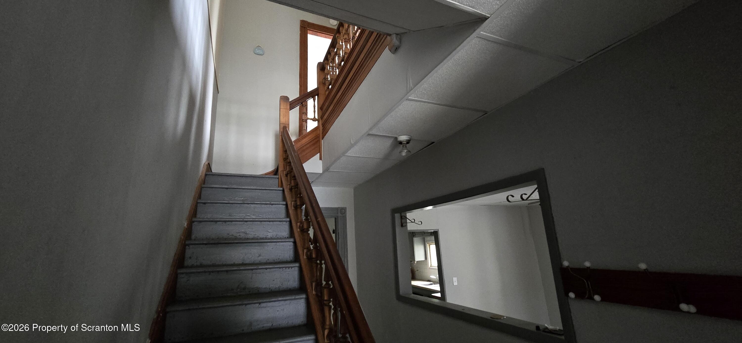 1140-1142 Academy Street Scranton, PA 18504 - Photo 18 of 49 a view of entryway and hall with wooden floor