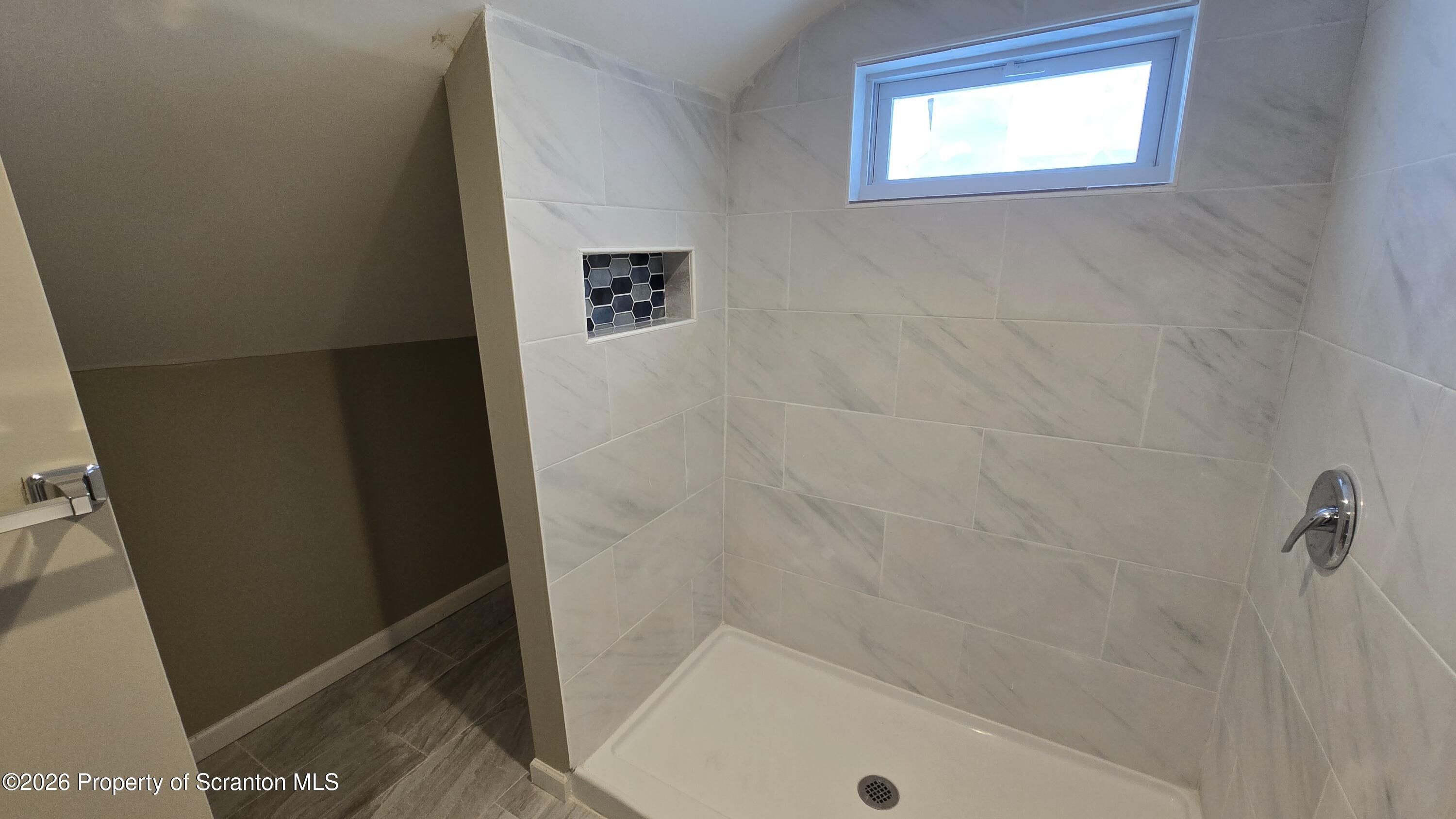 1140-1142 Academy Street Scranton, PA 18504 - Photo 44 of 49 a bathroom with a shower