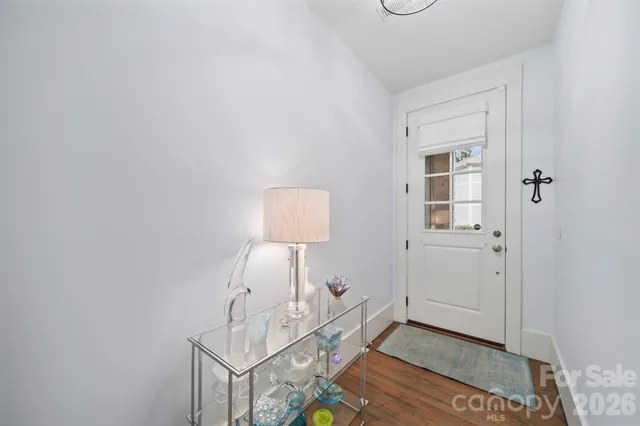 a room with a table and a window