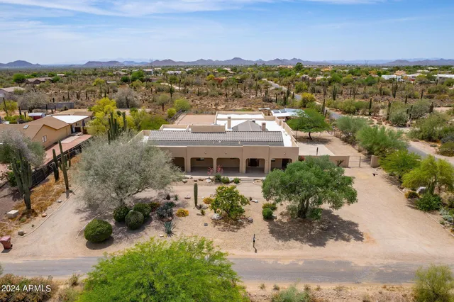 a view of a city with mountains in the background