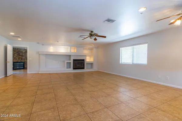 a view of a kitchen with a sink and a window