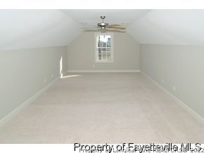 Lot 12 Booth Pond Road Raeford, NC 28376 - Photo 10 of 11 a view of empty room with windows