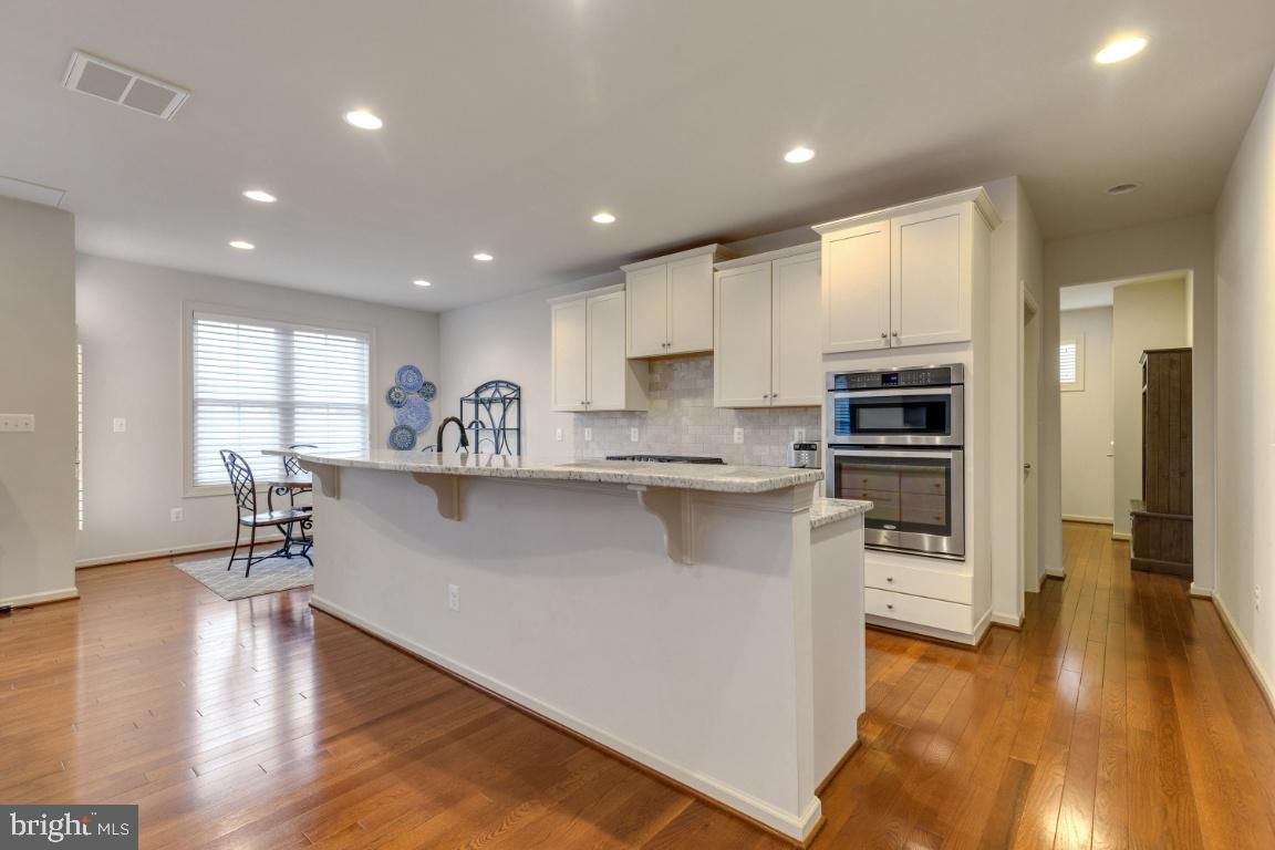 23578 Prosperity Ridge Place Brambleton, VA 20148 - Photo 4 of 42 Gourmet Kitchen with Breakfast Bar