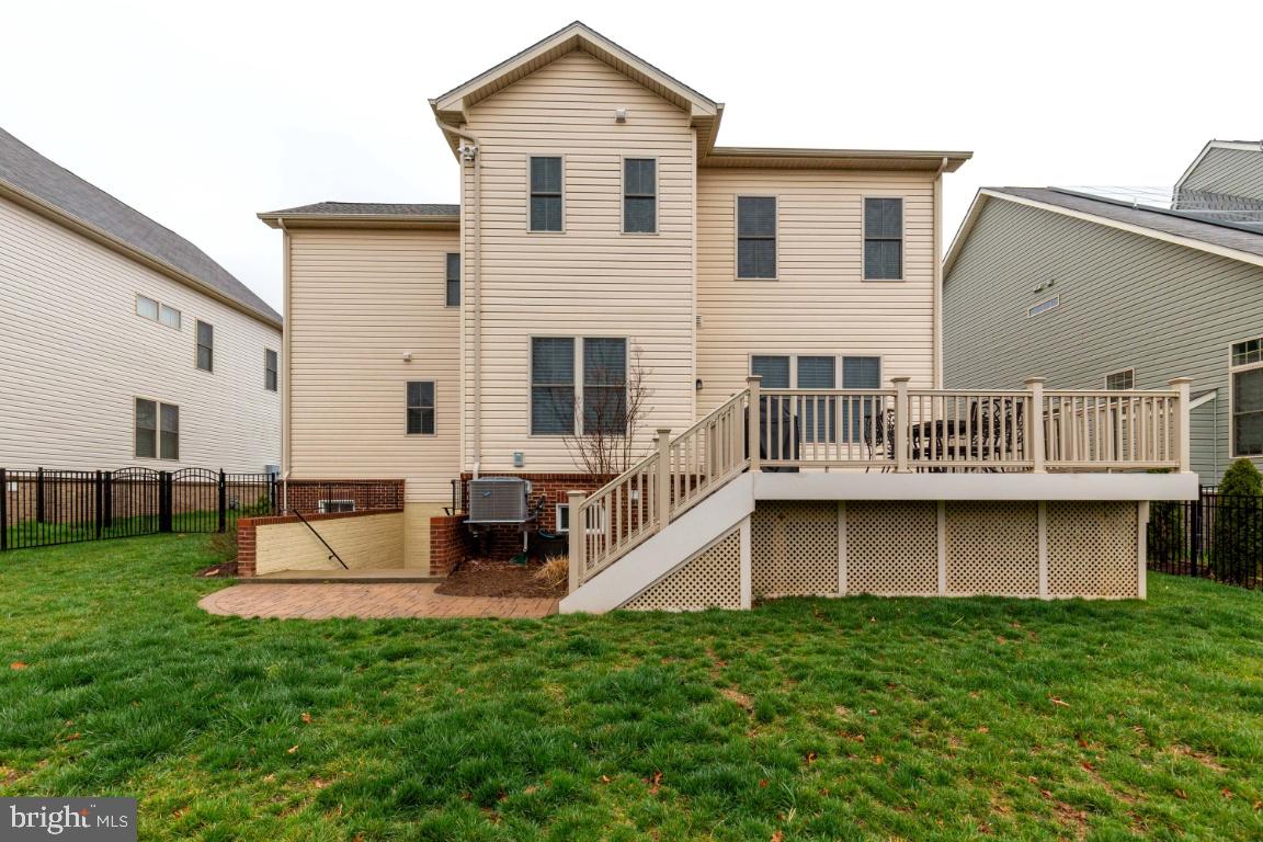 23578 Prosperity Ridge Place Brambleton, VA 20148 - Photo 37 of 42 Patio with Walkway to Basement