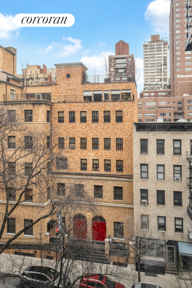 330 East 70th Street, Unit 5G Manhattan, NY 10021 - Photo 8 of 17 a front view of a multi story building