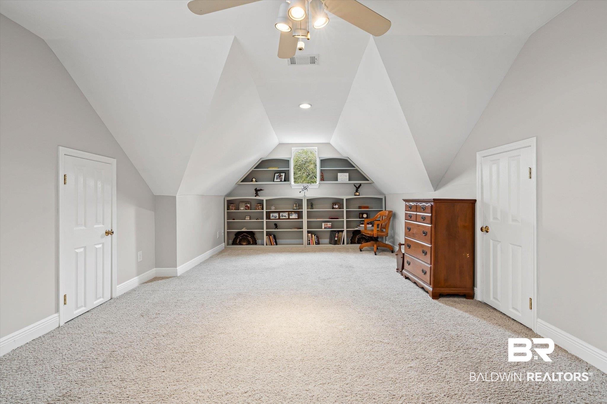 4851 Audubon Drive Mobile, AL 36619 - Photo 22 of 46 Additional living space with lofted ceiling, light carpet, built in shelves, and recessed lighting