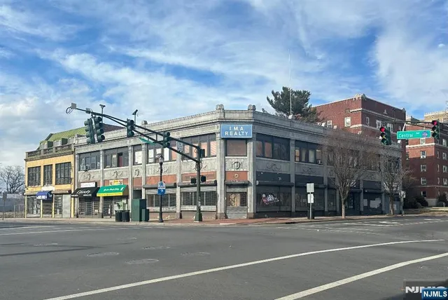 a view of a building with a street