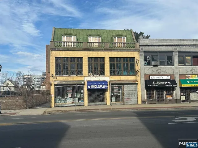 a view of a building with a street