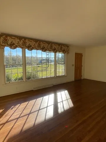 a view of an empty room and window