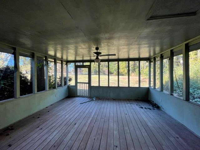 809 George W Towns Road Talbotton, GA 31827 - Photo 22 of 23 an empty room with wooden floor and windows