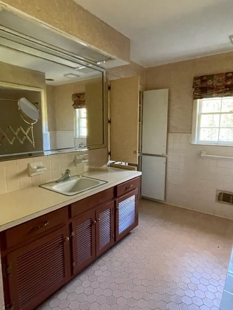 809 George W Towns Road Talbotton, GA 31827 - Photo 10 of 23 a bathroom with a granite countertop sink and a mirror