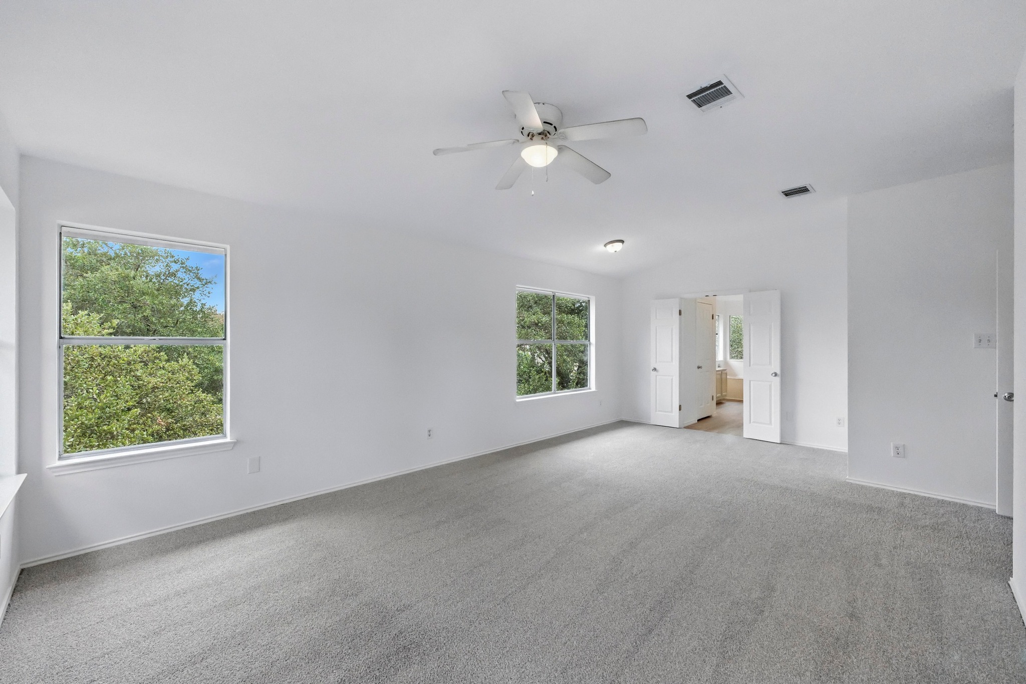 2113 Lobelia Drive Cedar Park, TX 78613 - Photo 17 of 38 an empty room with windows and closet