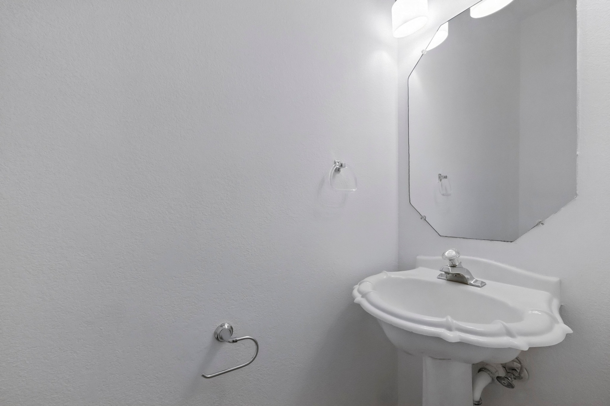 2113 Lobelia Drive Cedar Park, TX 78613 - Photo 27 of 38 a bathroom with a sink and mirror