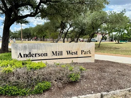 a view of a park with swings and slides