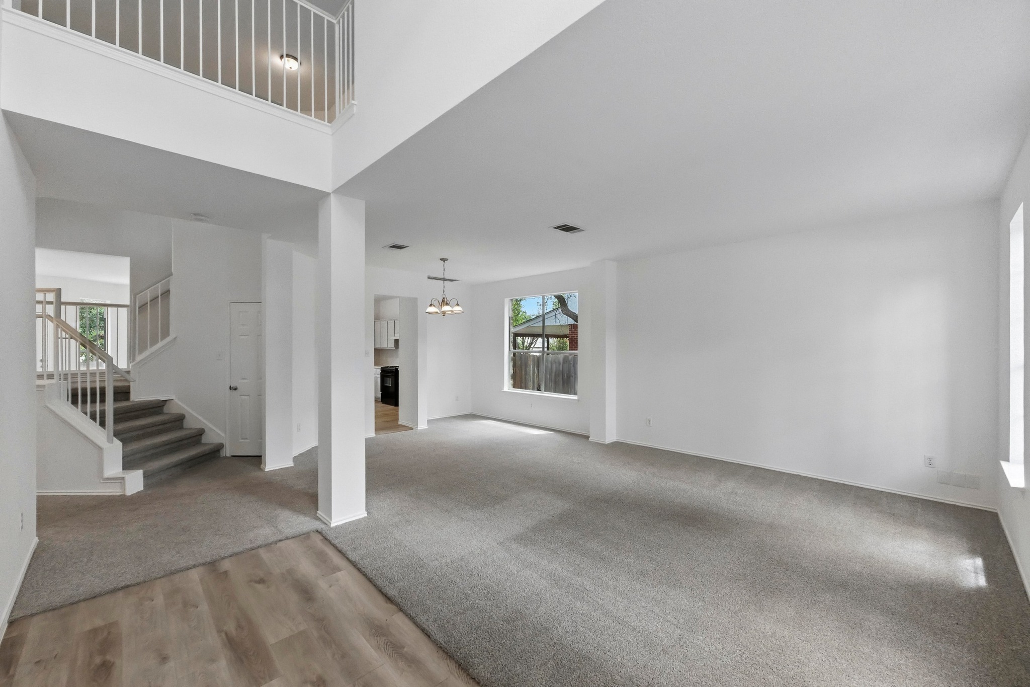 2113 Lobelia Drive Cedar Park, TX 78613 - Photo 5 of 38 a view of a livingroom with an empty space and a window