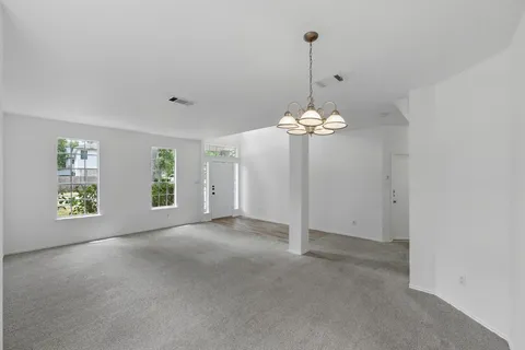 a view of an empty room with window